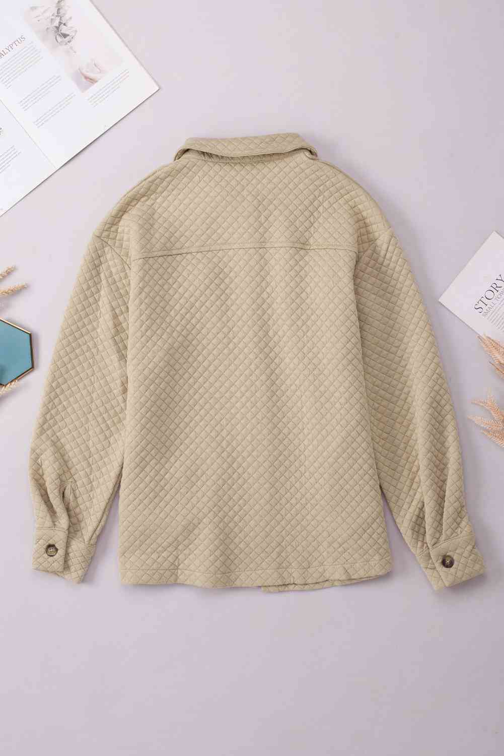 Veste boutonnée à col confortable, légère, de conception classique avec poches