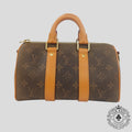 Louis Vuitton Monogramme Poussière Keepall 25