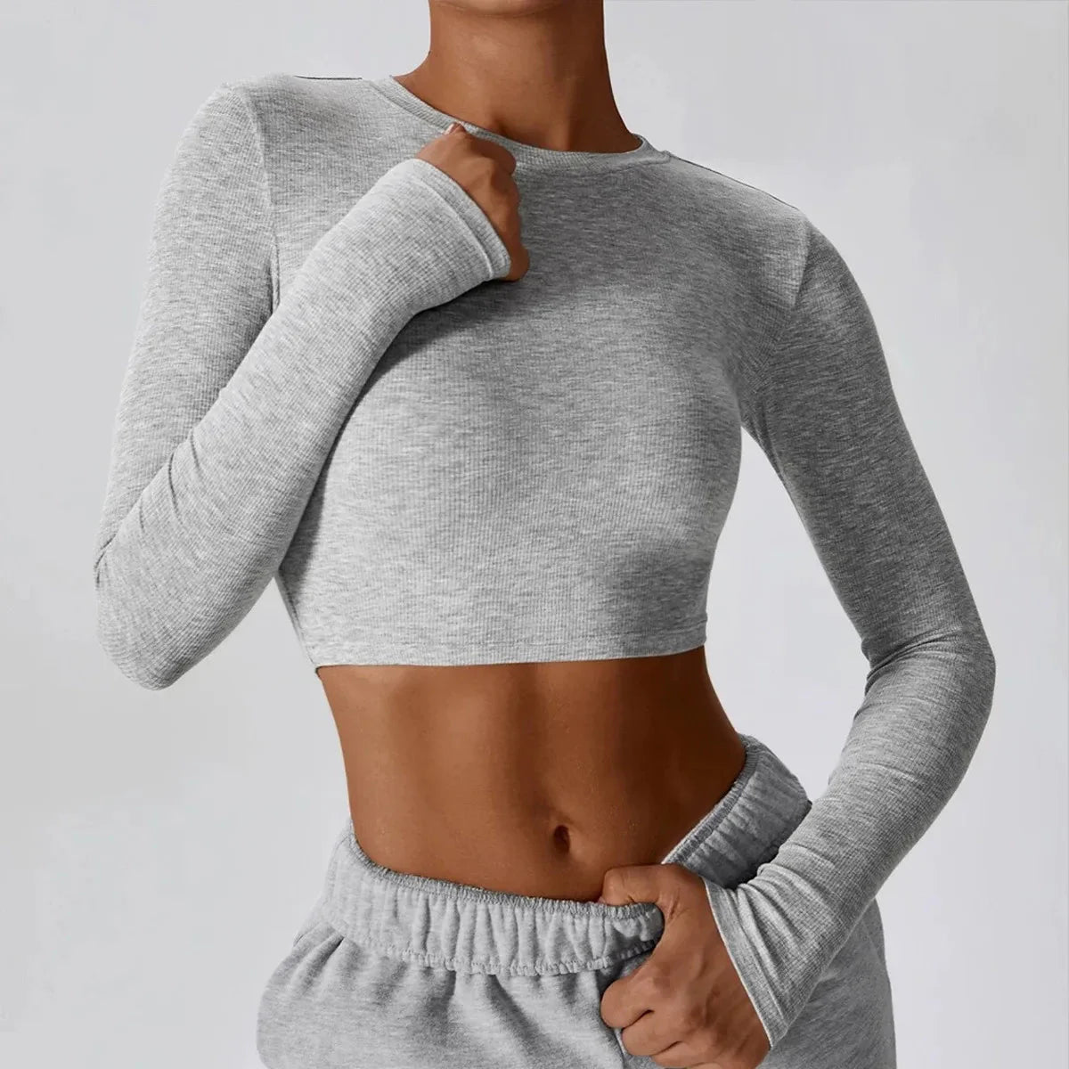 🧘‍♀️ Haut de yoga ajusté à manches longues pour femme
