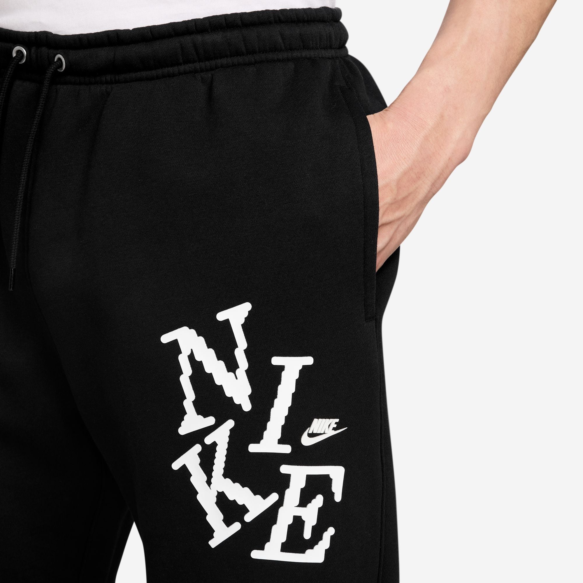 Jogging en molleton avec revers Nike pour homme – Noir