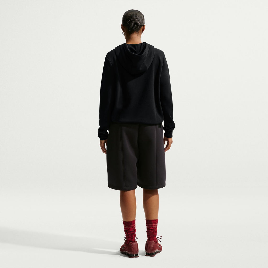 Haut à capuchon Nike en molleton à motif pour femme – Noir