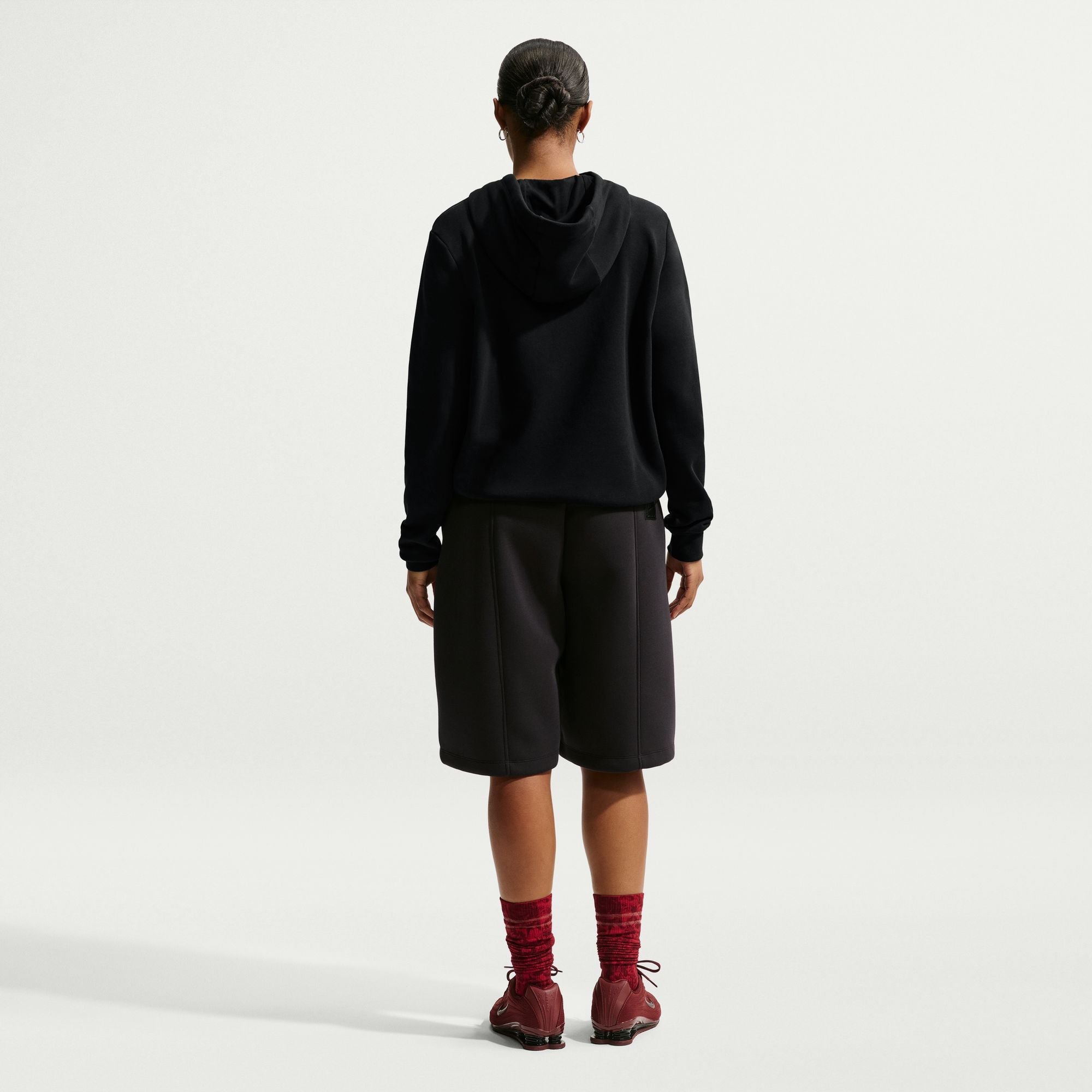 Haut à capuchon Nike en molleton à motif pour femme – Noir