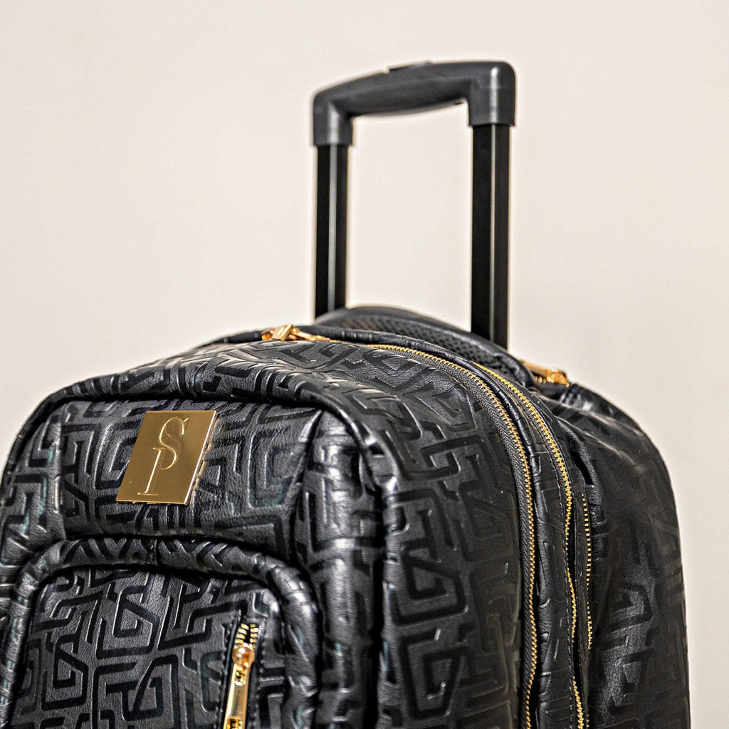 Sac de voyage à roulettes en cuir noir monogrammé (édition limitée à 150 exemplaires)