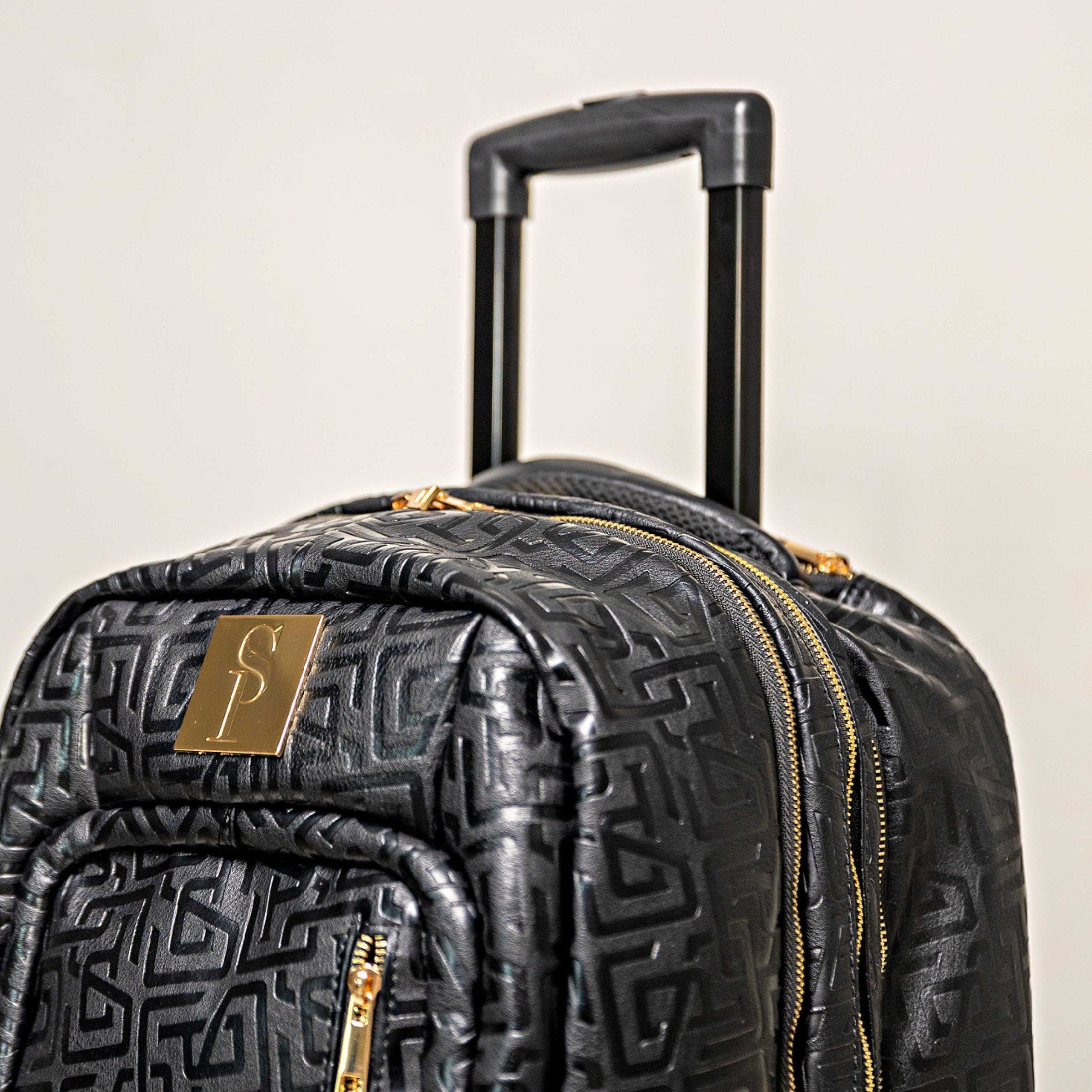 Sac de voyage à roulettes en cuir noir monogrammé (édition limitée à 150 exemplaires)