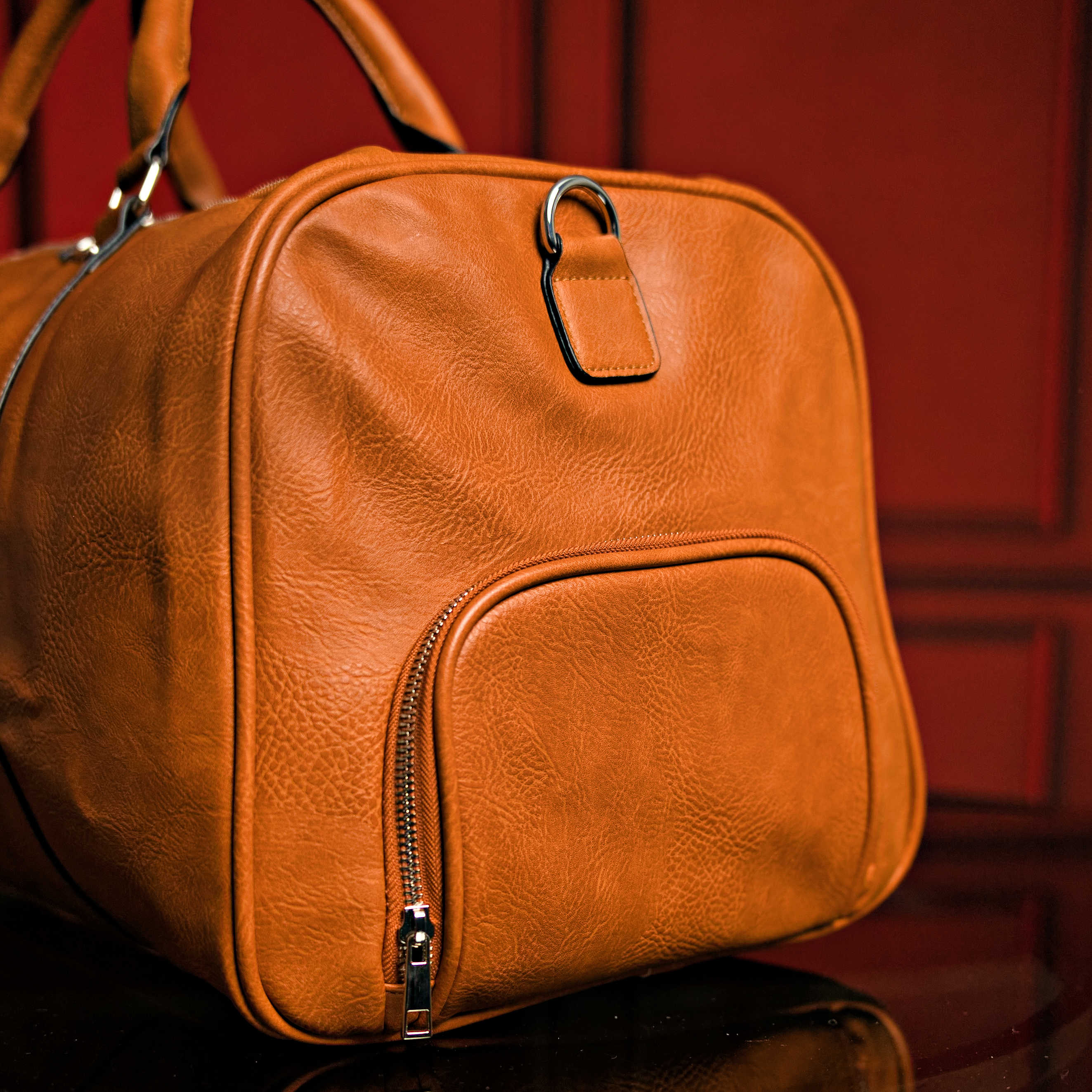 Sac de voyage en cuir marron effet vieilli