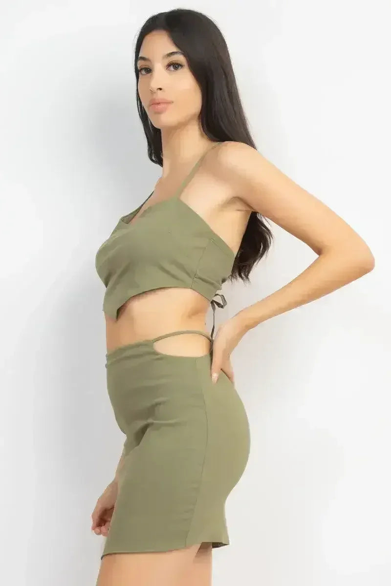 Ensemble haut asymétrique dos croisé et jupes