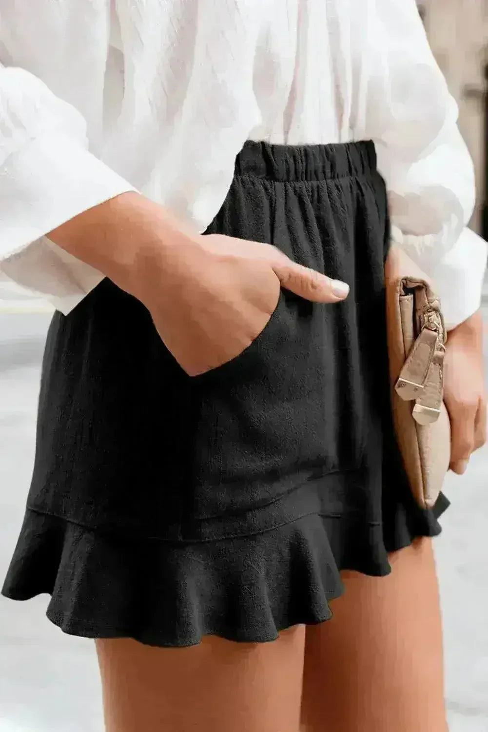 Shorts décontractés en lin et coton noirs à volants avec poches