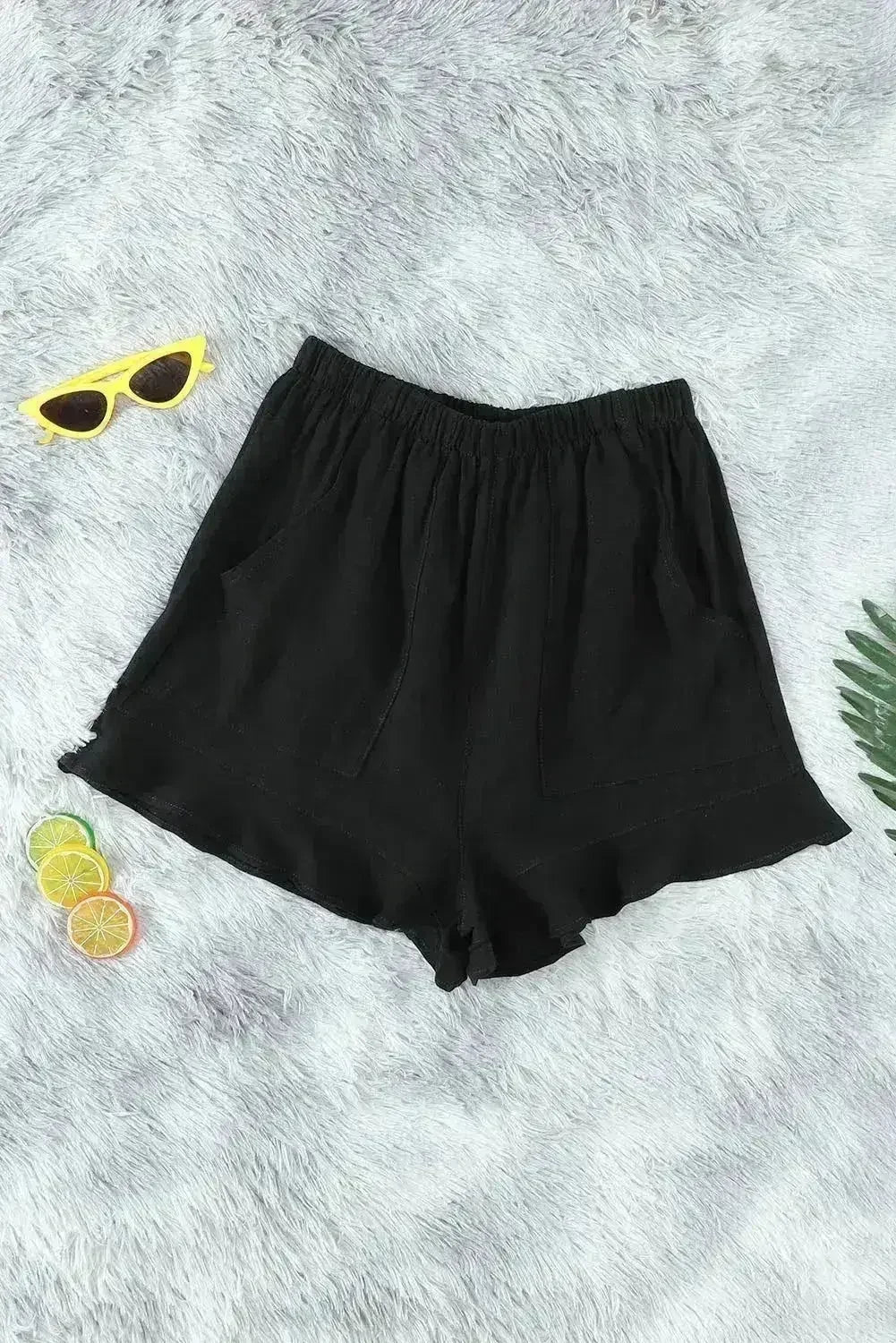 Shorts décontractés en lin et coton noirs à volants avec poches