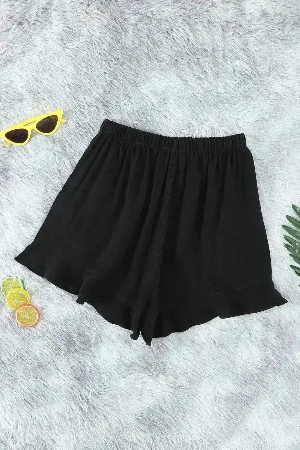 Shorts décontractés en lin et coton noirs à volants avec poches