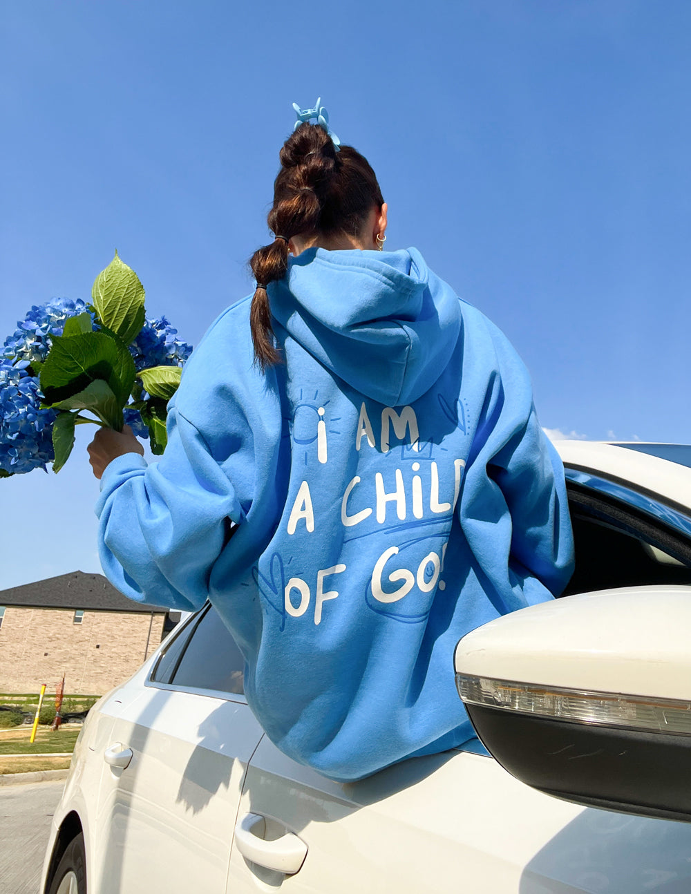 Sweat à capuche unisexe Enfant de Dieu