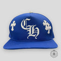 Casquette Chrome Hearts en cuir à écusson croix bleue