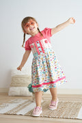 Robe fille à bretelles imprimé floral platine