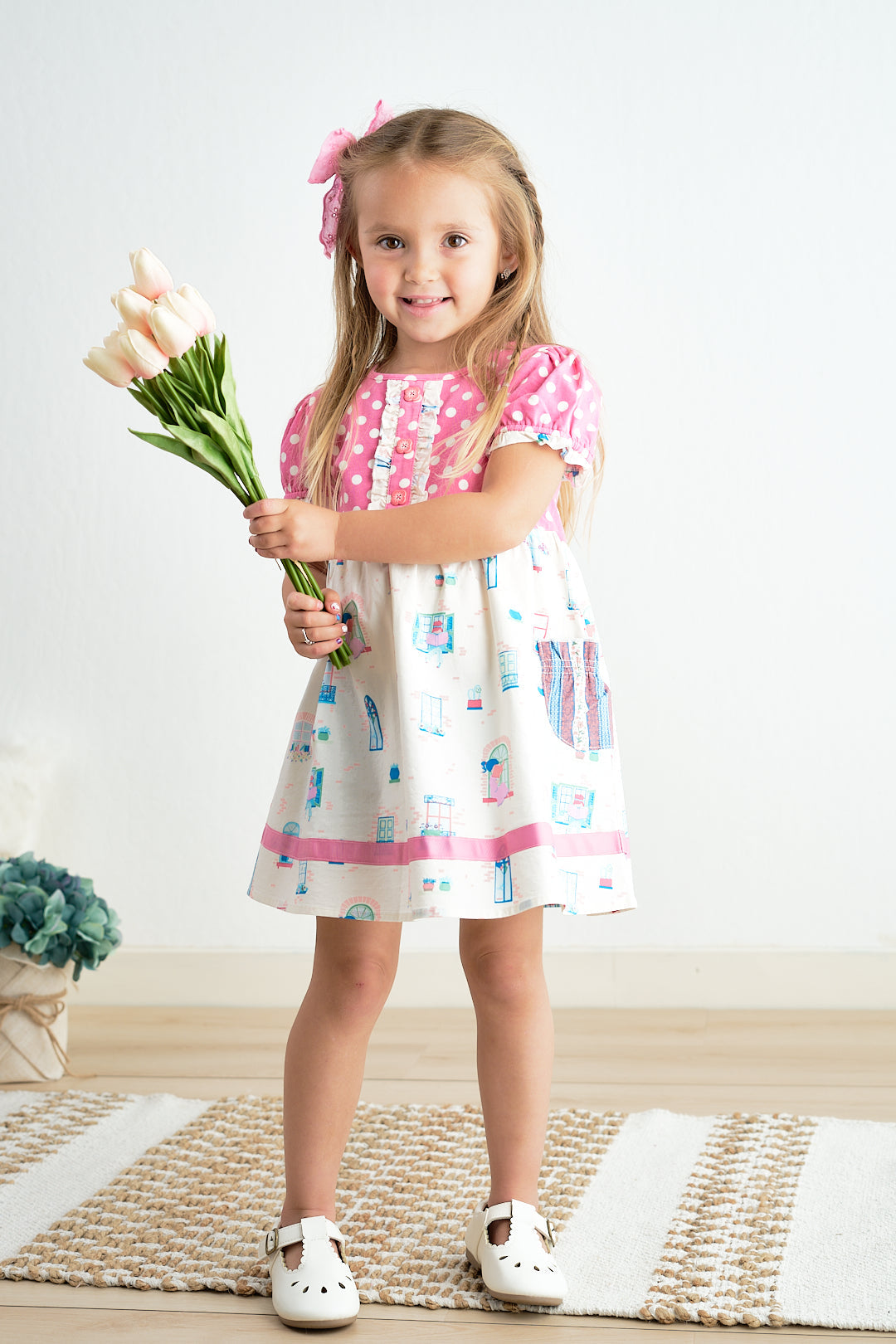 Robe à pois roses balcon platine