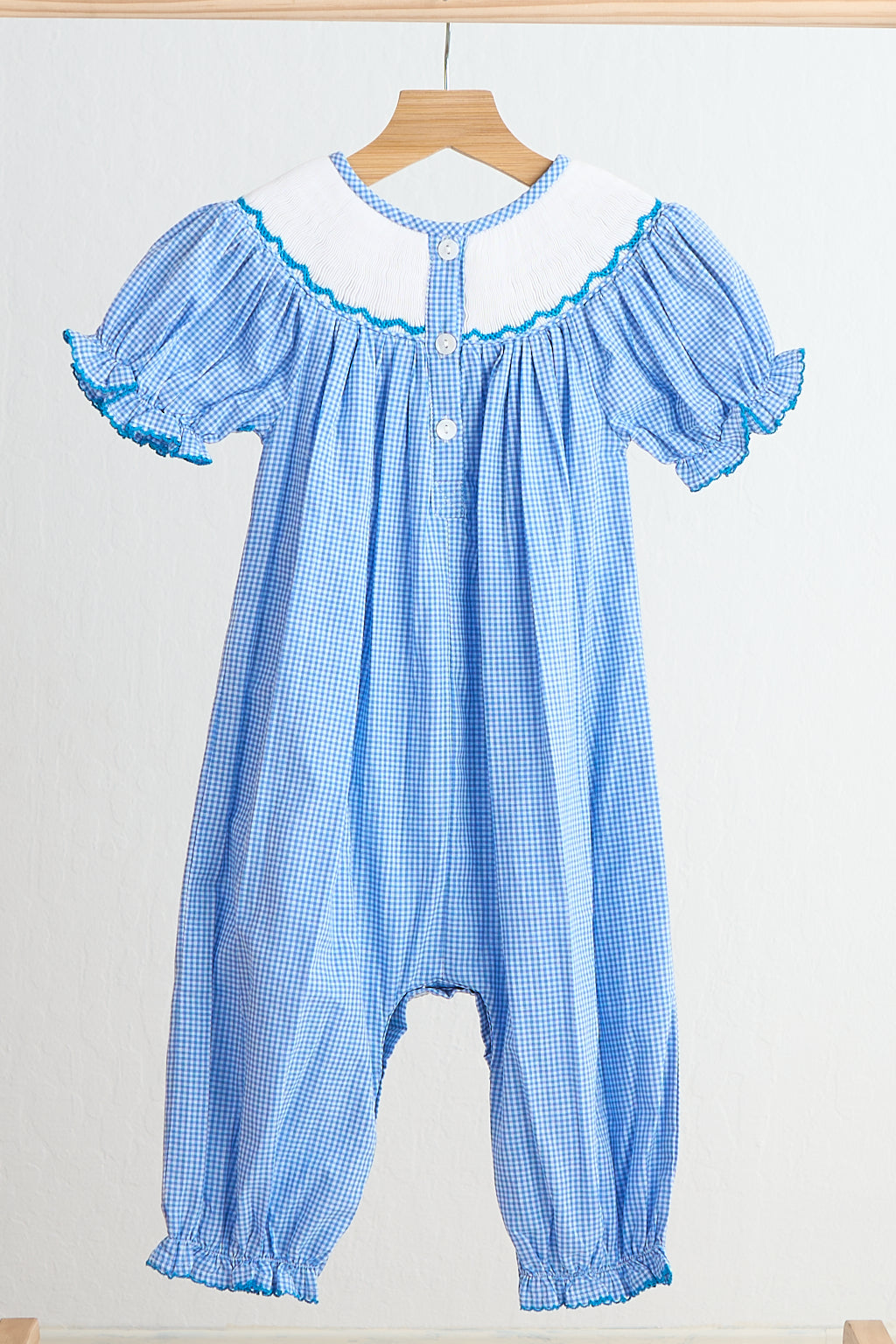 Barboteuse bébé fille smockée à la main vichy princesse des neiges bleue
