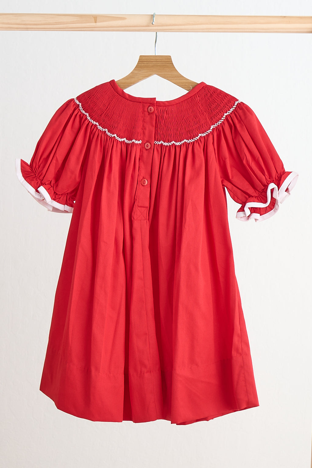 Robe smockée main bonbon rouge