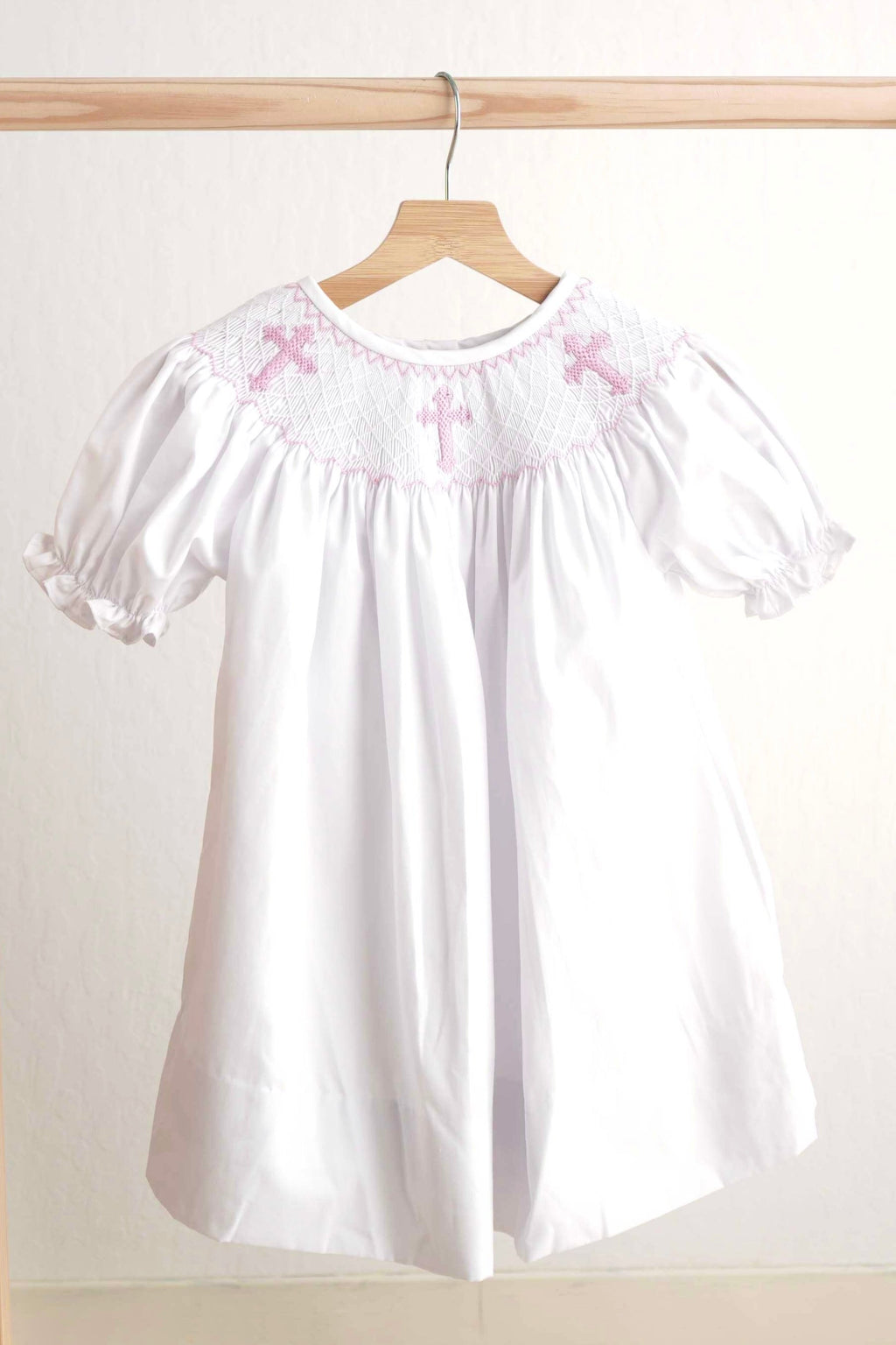 Robe fille smockée main croix de Pâques rose