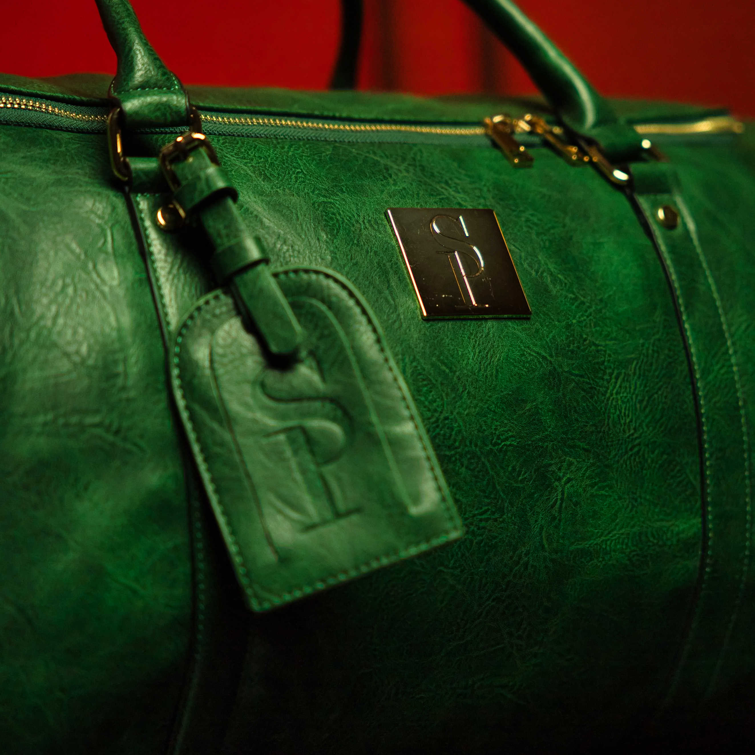 Sac de voyage polochon en cuir vert émeraude