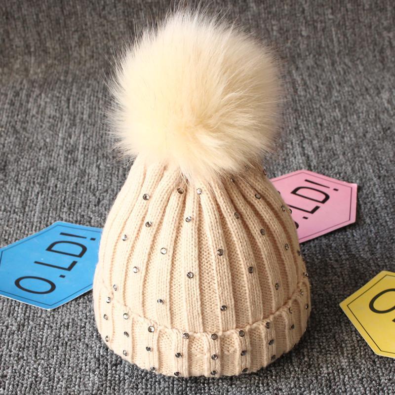 Tendance modeBonnet en fourrure tricotée chaude avec pompons pour bébés filles, idéal pour l'hiver, style élégant