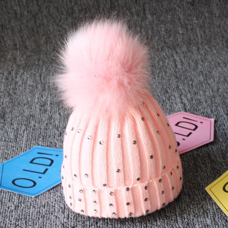 Tendance modeBonnet en fourrure tricotée chaude avec pompons pour bébés filles, idéal pour l'hiver, style élégant