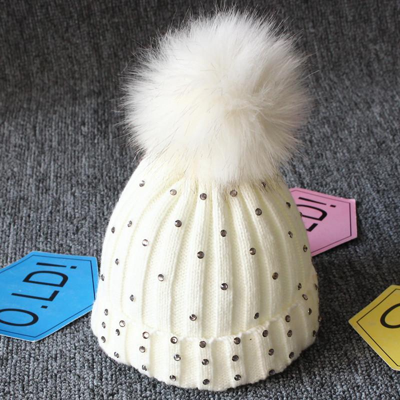 Tendance modeBonnet en fourrure tricotée chaude avec pompons pour bébés filles, idéal pour l'hiver, style élégant