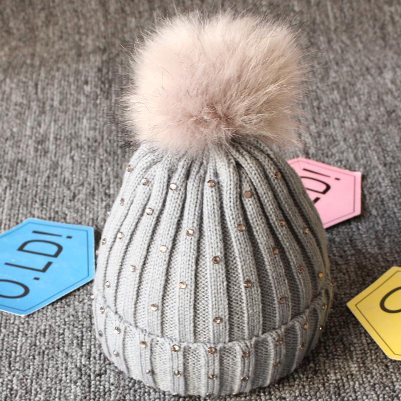 Tendance modeBonnet en fourrure tricotée chaude avec pompons pour bébés filles, idéal pour l'hiver, style élégant