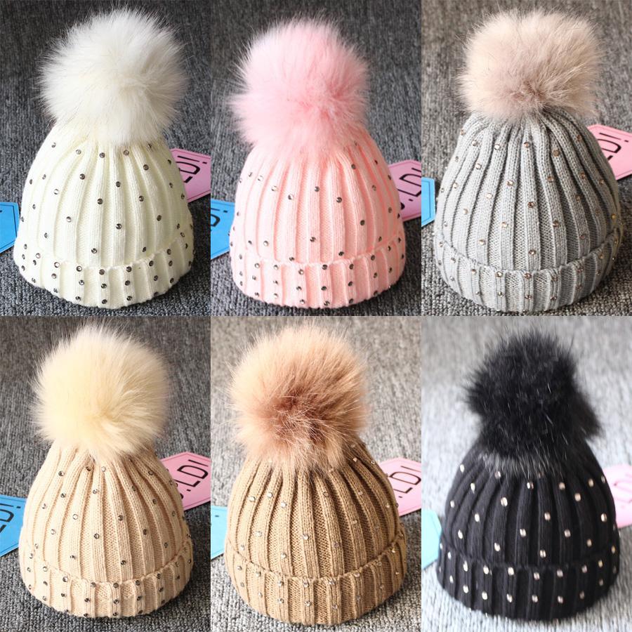 Tendance modeBonnet en fourrure tricotée chaude avec pompons pour bébés filles, idéal pour l'hiver, style élégant
