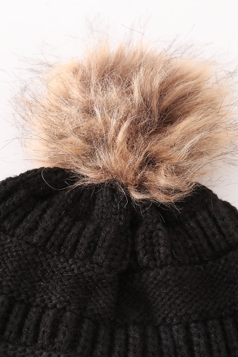 Bonnet à pompon en tricot torsadé noir