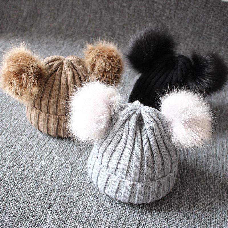 Bonnet tricoté chaud d'hiver pour bébés filles avec pompons en fourrure, uni, chaud, mignon, adorable, pour filles bébés, au design de luxe moderne