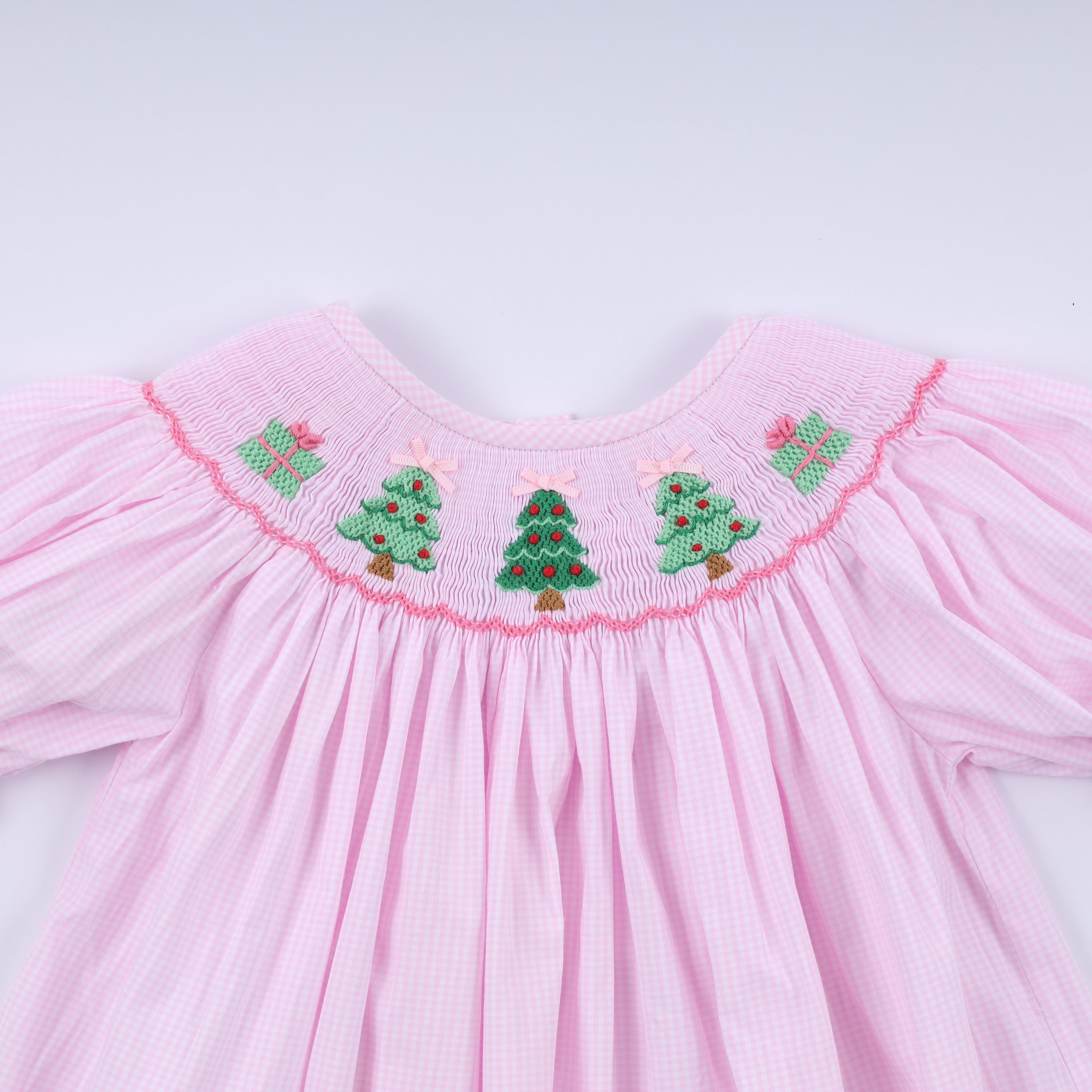 Robe rose à smocks faite main pour Noël