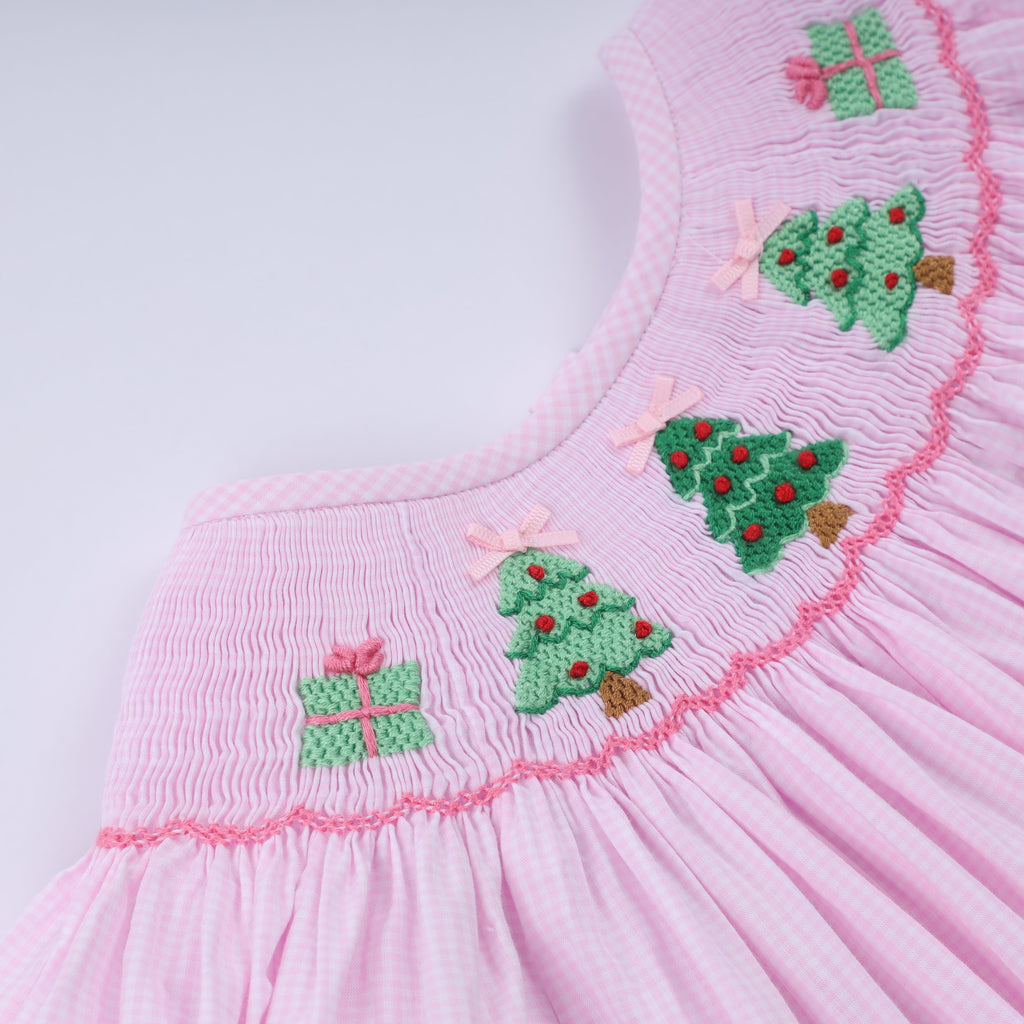 Robe rose à smocks faite main pour Noël