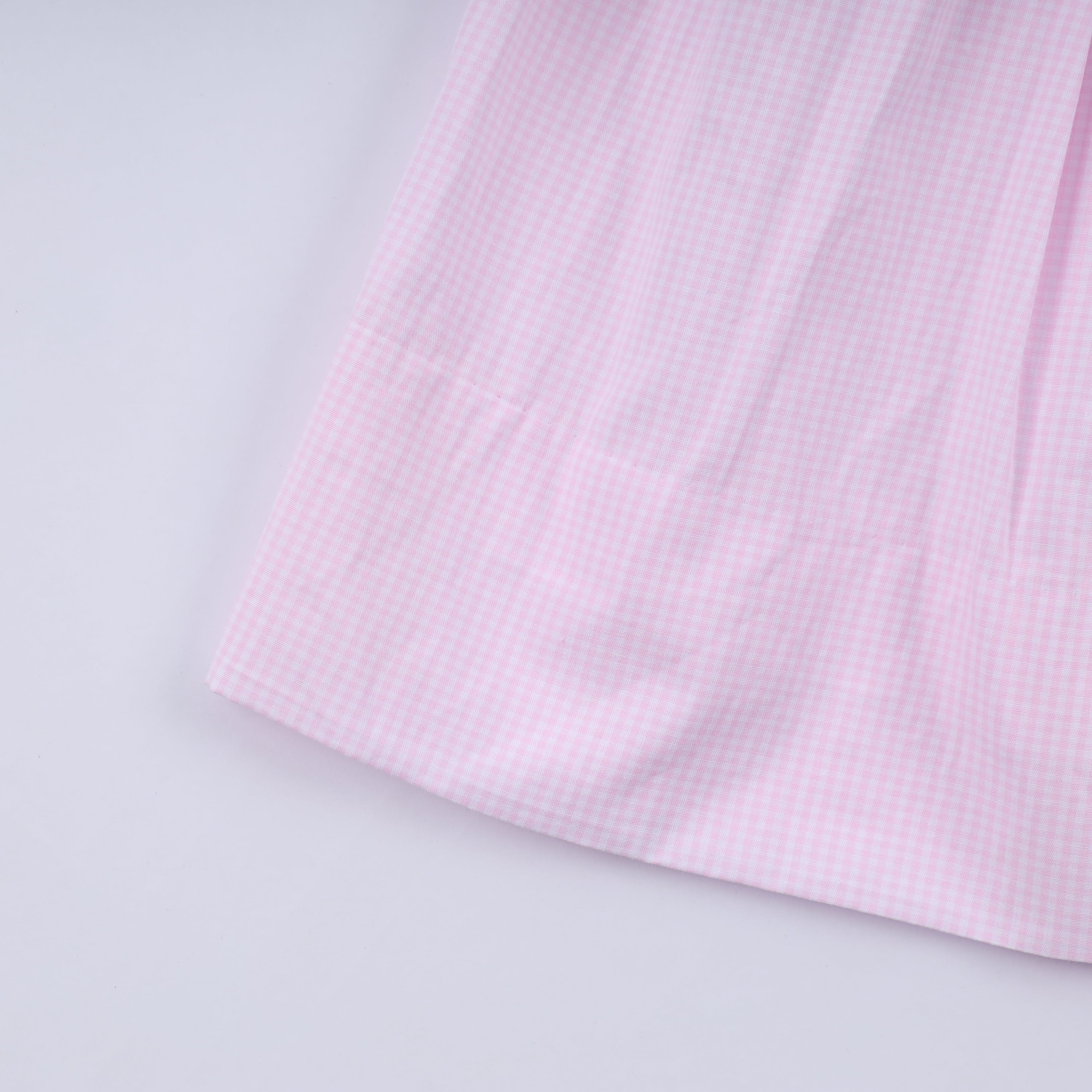 Robe rose à smocks faite main pour Noël