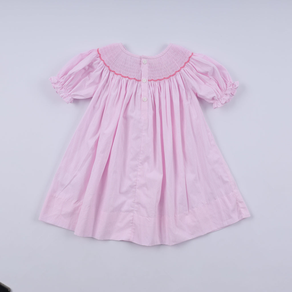Robe rose à smocks faite main pour Noël