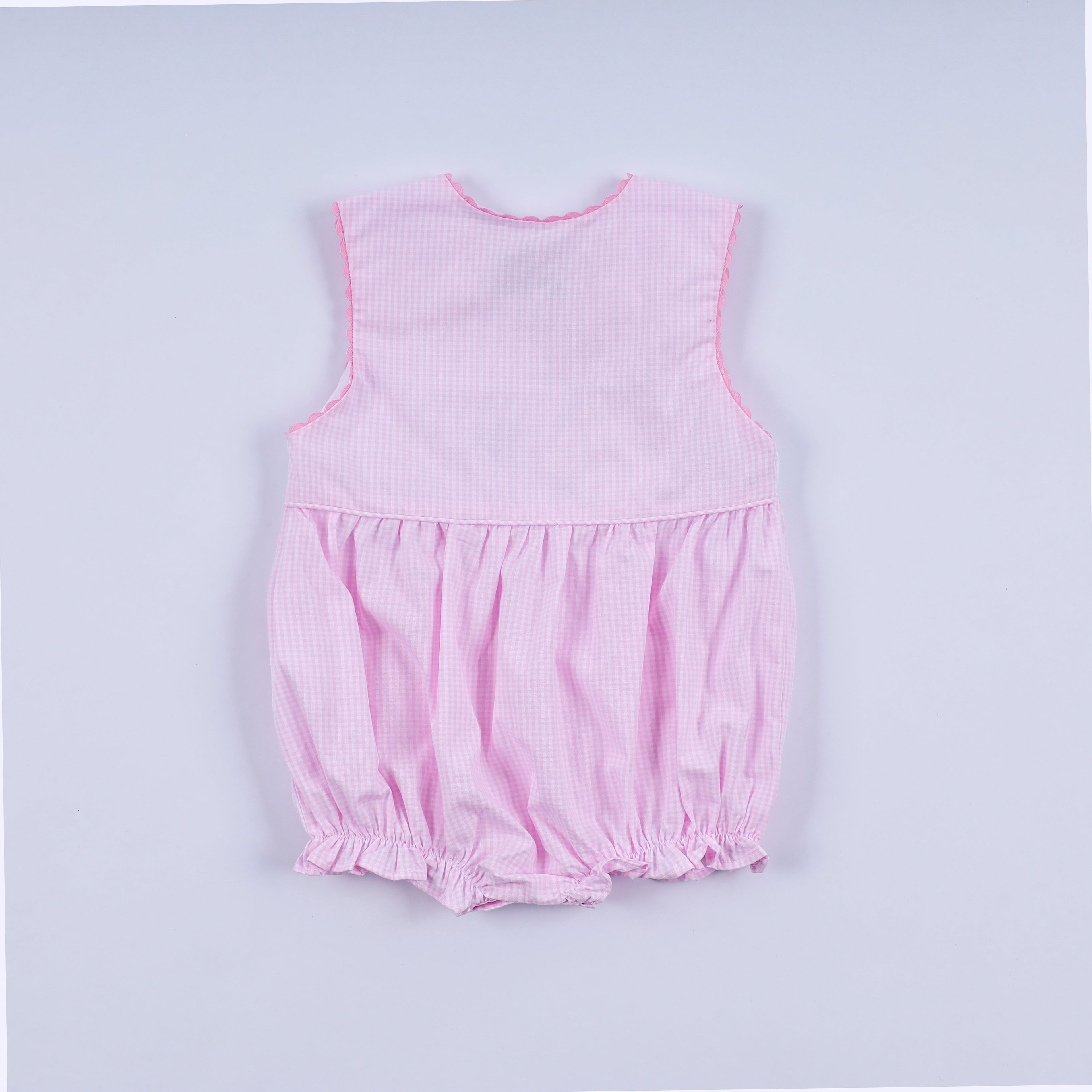 Barbotteuse écossaise à smocks main princesse rose