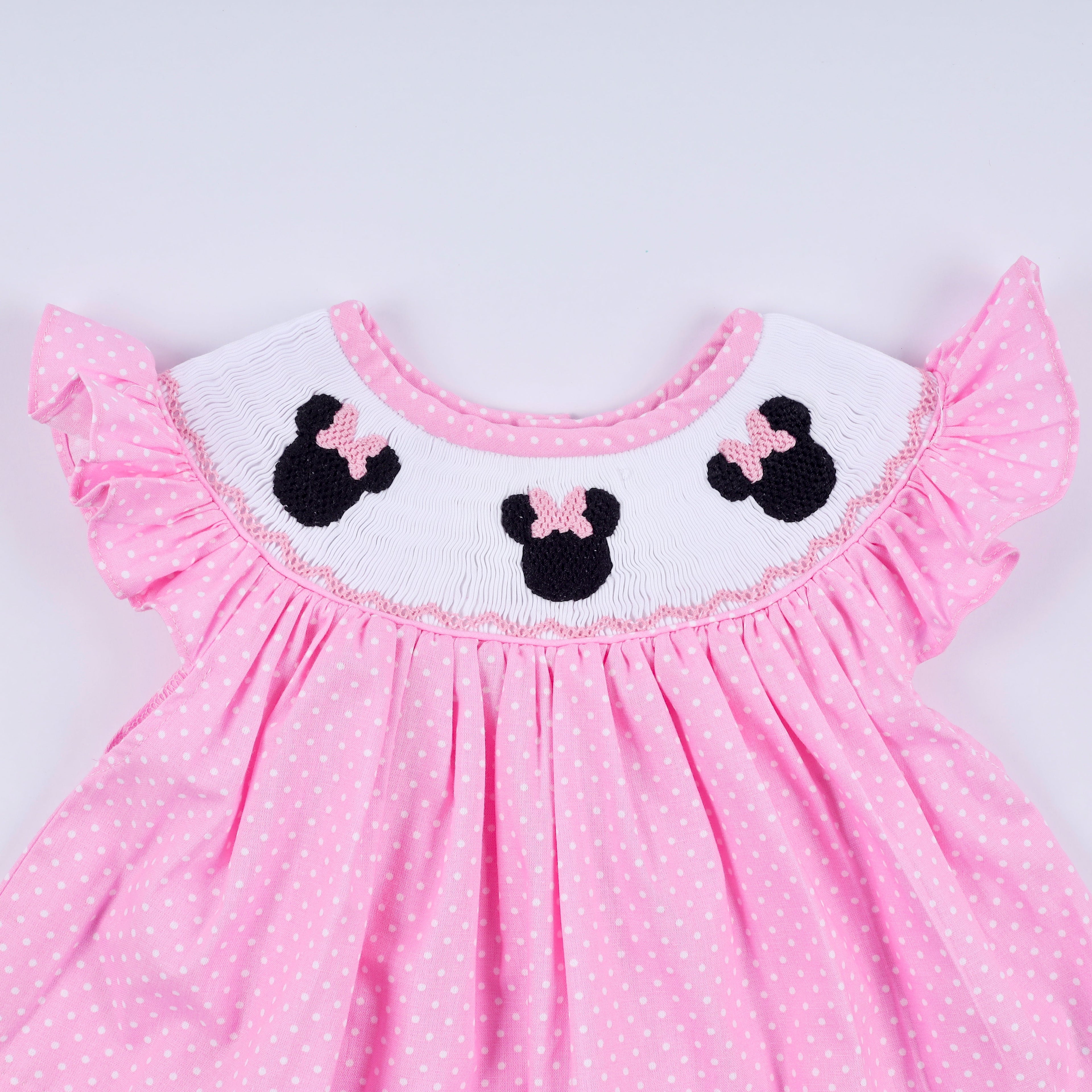 Ensemble bloomer rose à pois smockés main et volant