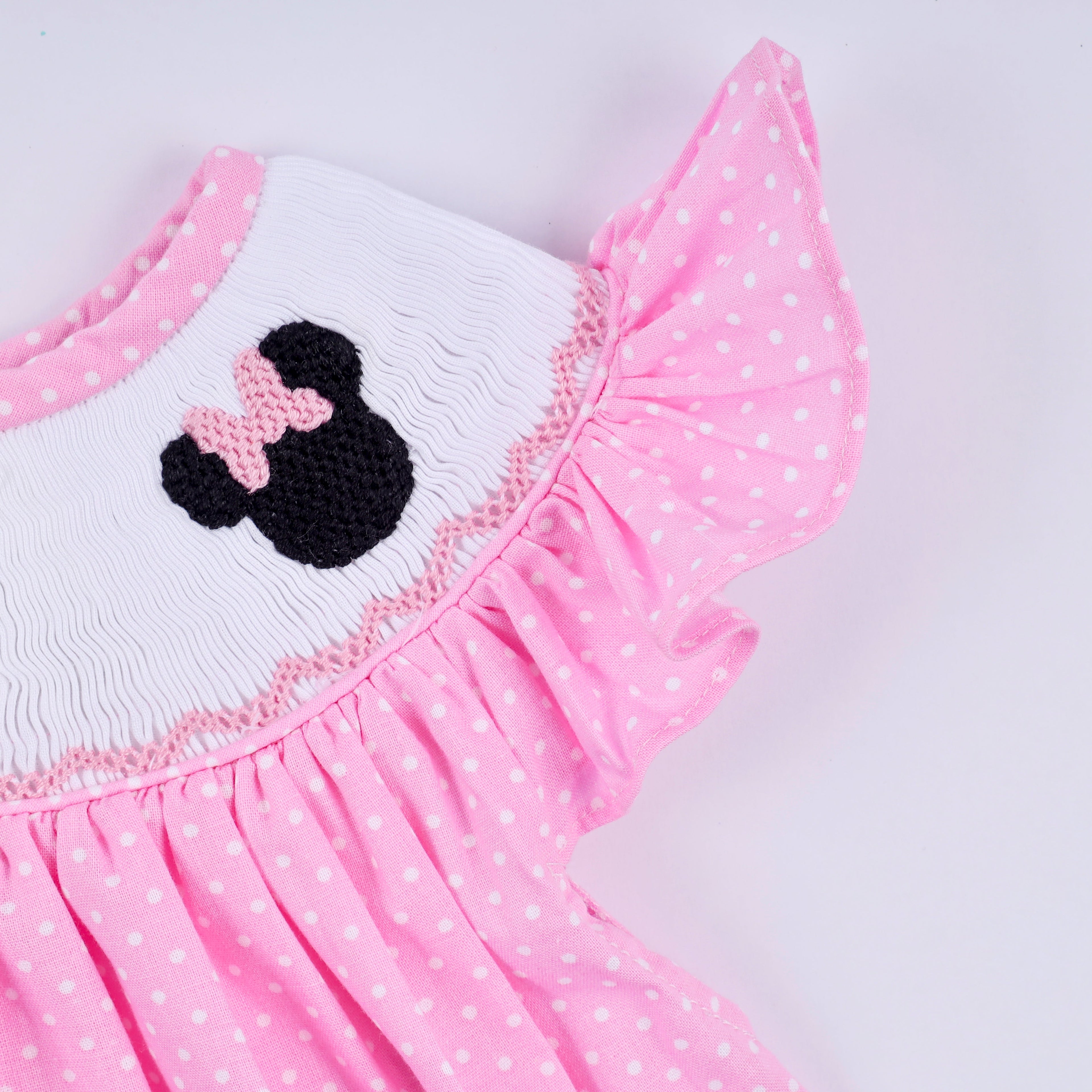 Ensemble bloomer rose à pois smockés main et volant