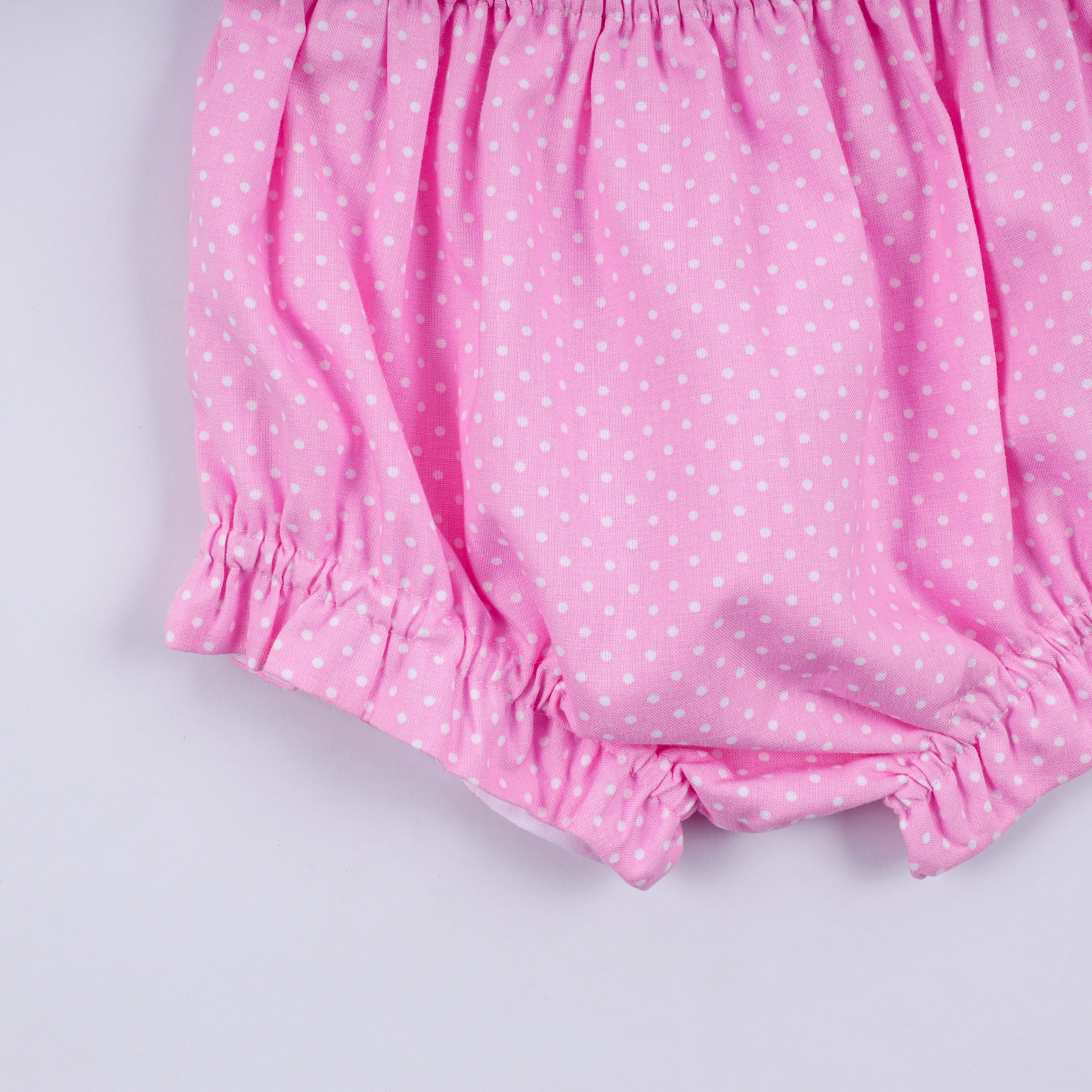 Ensemble bloomer rose à pois smockés main et volant