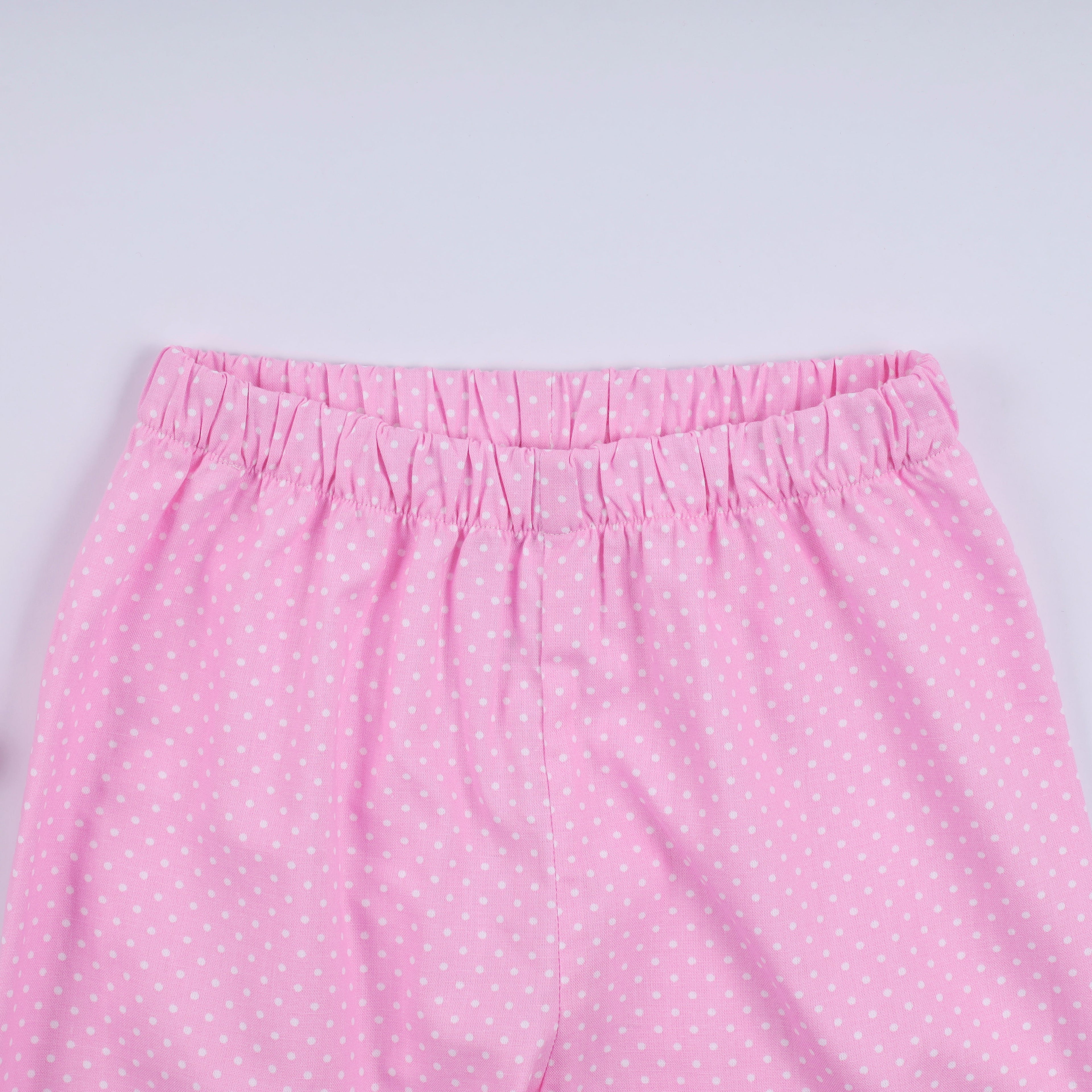 Ensemble pantalon à pois à volants smocké à la main, personnage rose