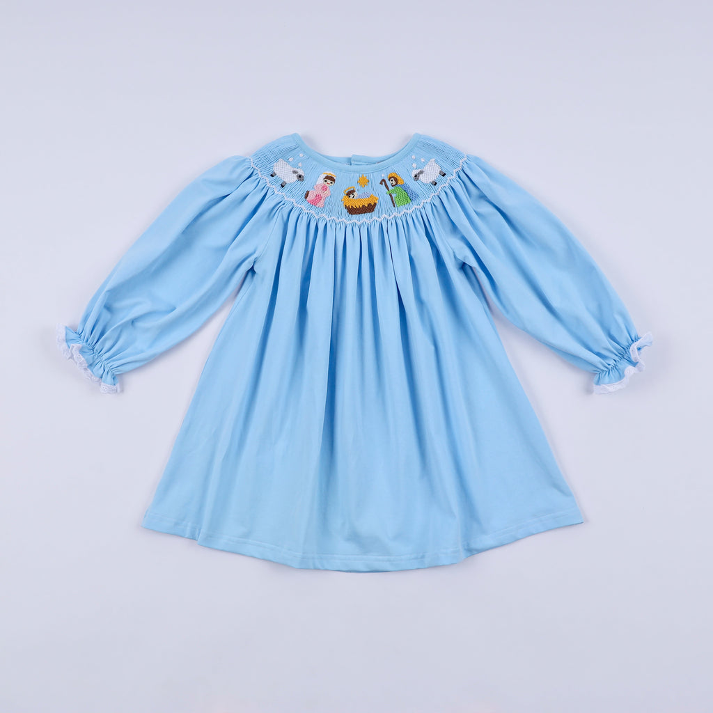 Robe bleue smockée à la main Nativité