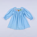 Robe bleue smockée à la main Nativité
