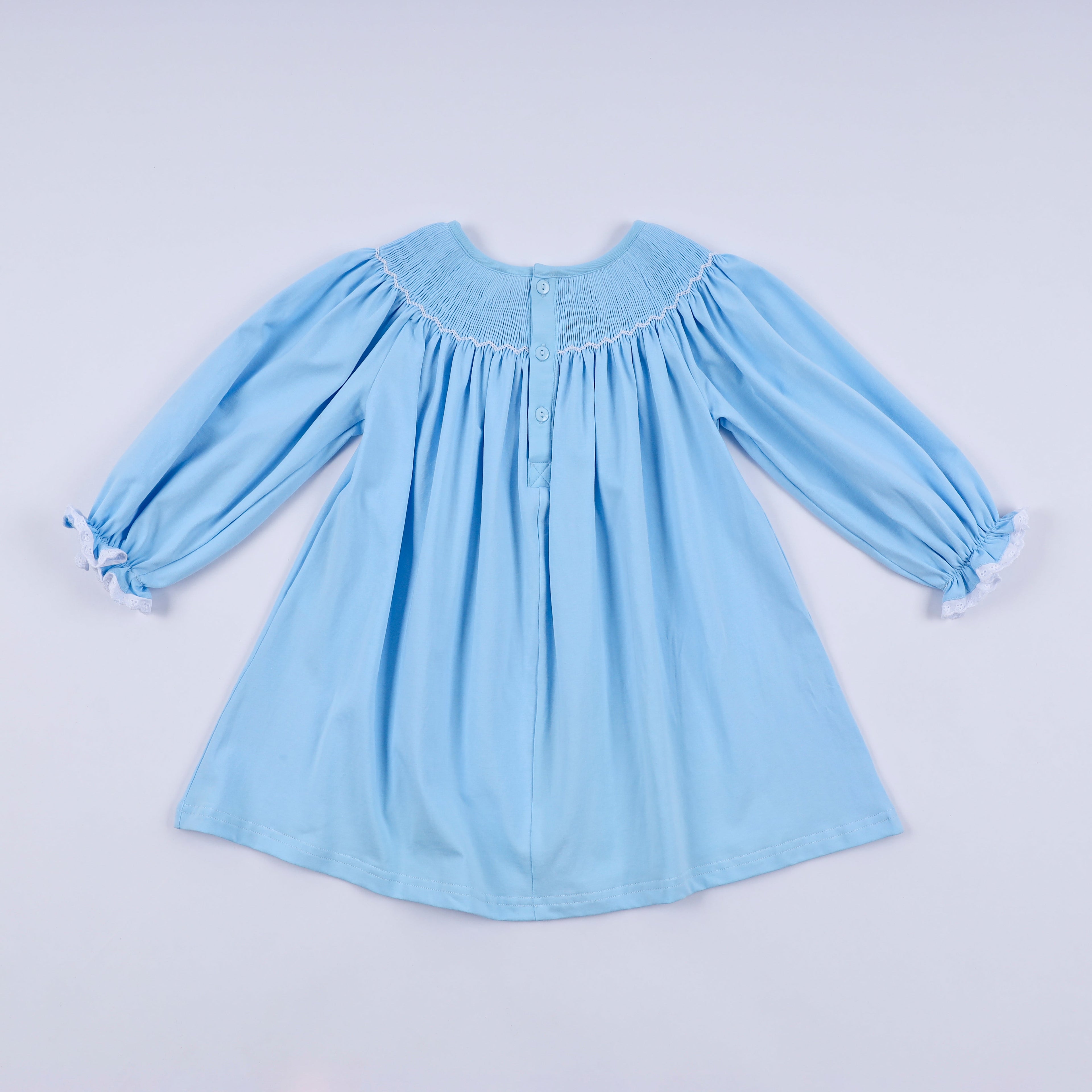 Robe bleue smockée à la main Nativité