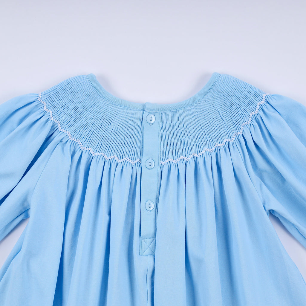 Robe bleue smockée à la main Nativité