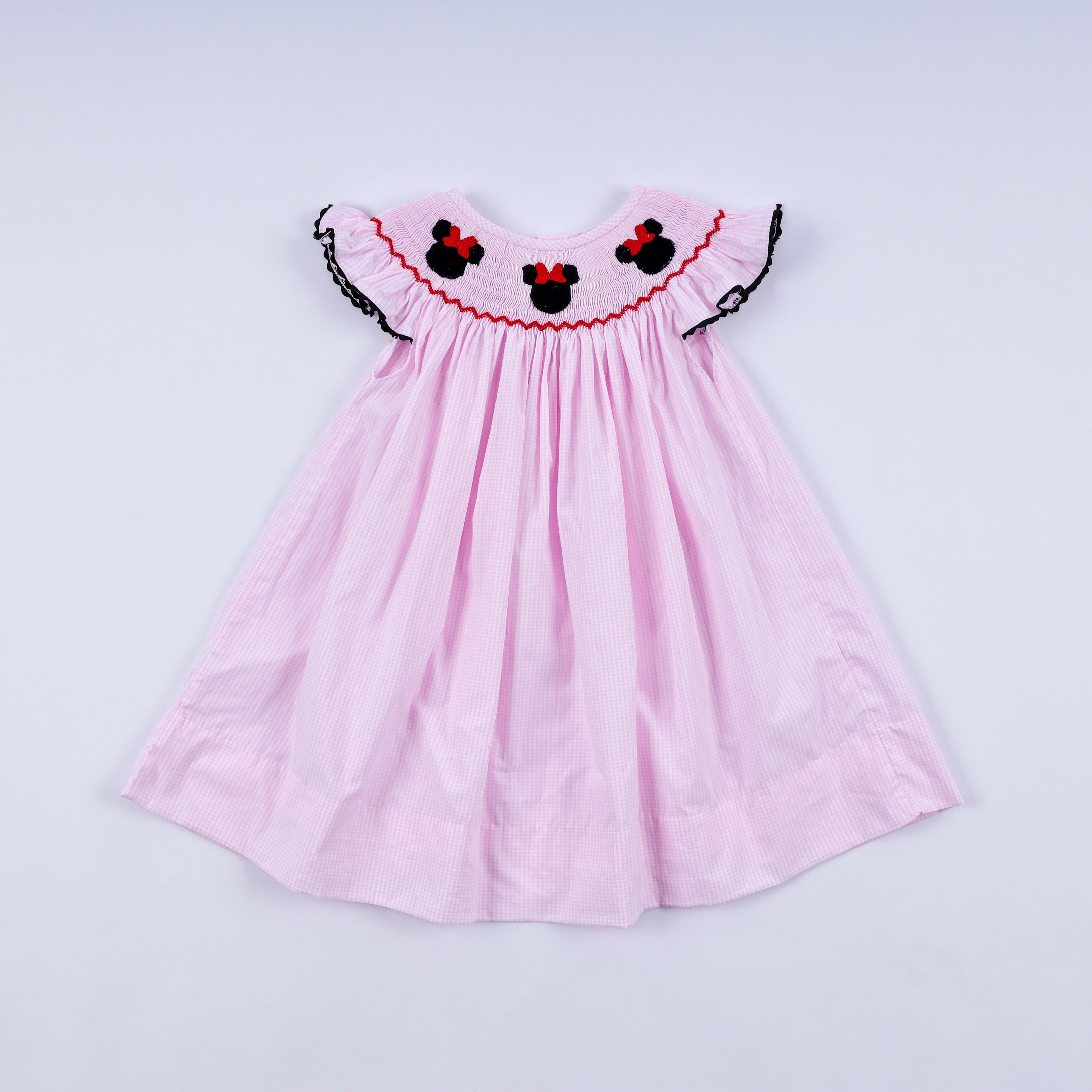 Robe à smocks et volants à carreaux rouge