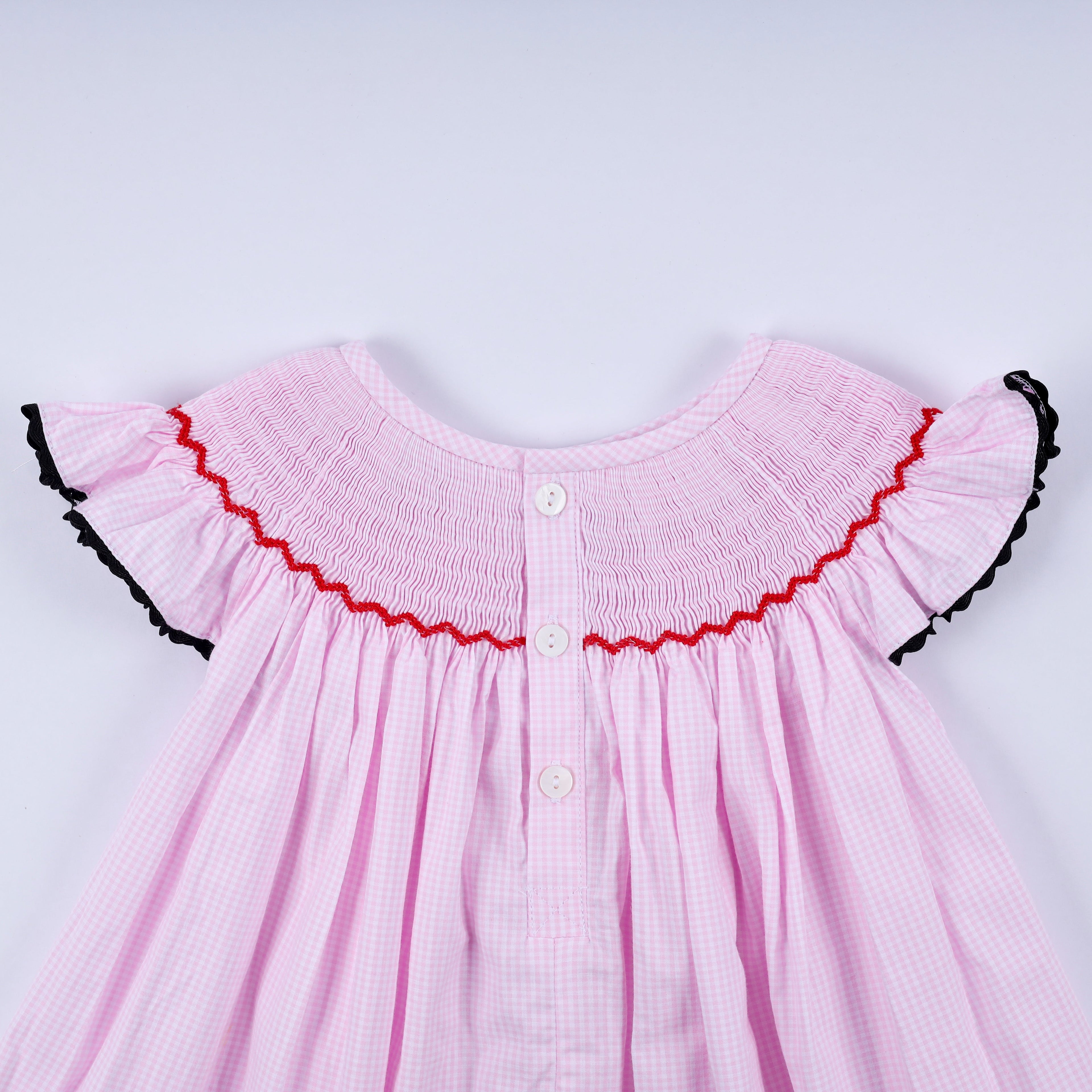 Robe à smocks et volants à carreaux rouge