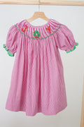 Robe vichy smockée main motif joie de Noël rose