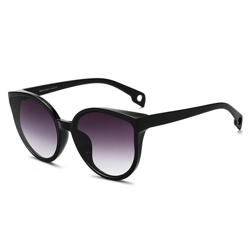 Lunettes de soleil de luxe modernes et élégantes pour femme avec monture en plastique œil de chat et verres transparents avec protection UV400