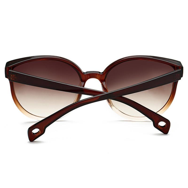Lunettes de soleil de luxe modernes et élégantes pour femme avec monture en plastique œil de chat et verres transparents avec protection UV400