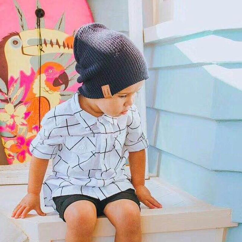Bonnet d'hiver moderne doux et chaud en tricot élastique pour enfants filles et garçons, casquette décontractée et chaude pour enfants