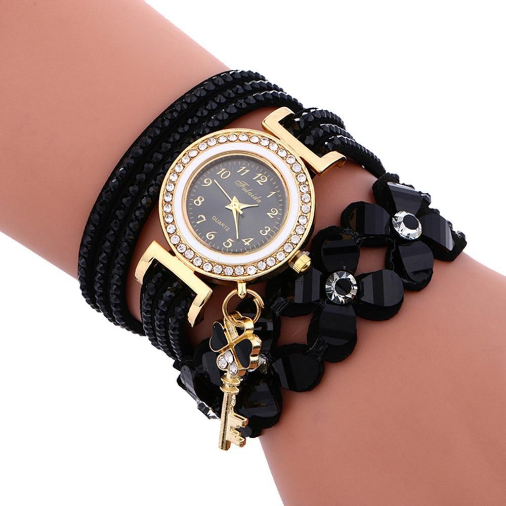 Montres femme Nouvelle montre décontractée de luxe à quartz analogique en alliage Bracelet en cuir PU Cadeau pour femme