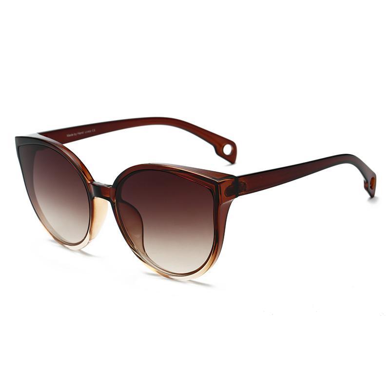 Lunettes de soleil de luxe modernes et élégantes pour femme avec monture en plastique œil de chat et verres transparents avec protection UV400