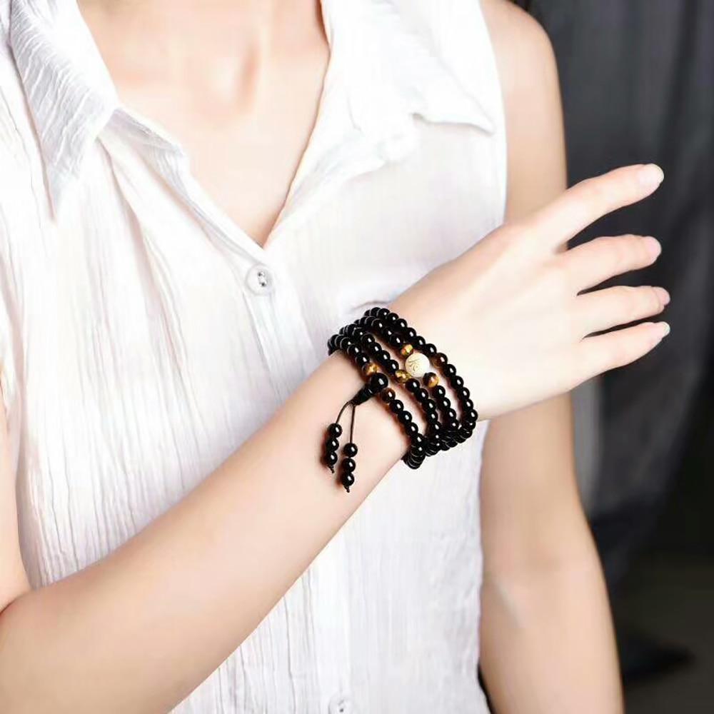 Bracelets perles fluorescentes noires élégantes de luxe modernes, faits à la main, magnifiques pour femmes ou hommes
